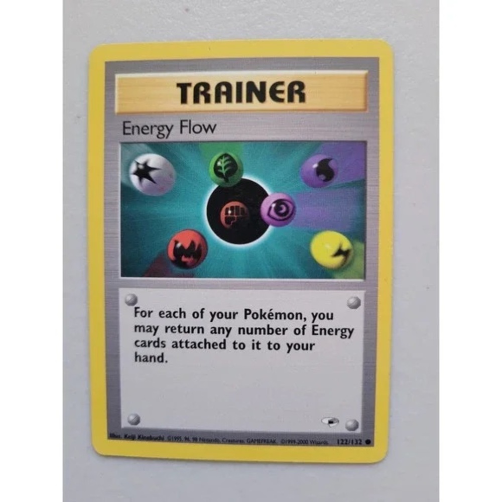 Pokemon Trainer Card with Colorful Energy Symbols